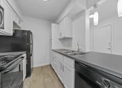 Thumbnail 55 of 58 - a kitchen with white cabinetry at Vesper, Dallas, TX, 75254