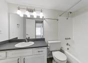 Thumbnail 57 of 58 - a bathroom with a sink toilet and bathtub at Vesper, Dallas, TX