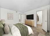 Thumbnail 35 of 58 - a bedroom with a bed and a dresser  at Vesper, Dallas