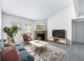 Thumbnail 39 of 58 - our apartments offer a living room with a fireplace  at Vesper, Dallas, TX, 75254