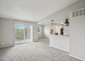 Thumbnail 50 of 63 - a living room with a door to a balcony at The Keller, Texas, 78230
