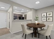 Thumbnail 51 of 55 - a dining room with a table and chairs and a kitchen