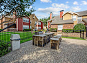 Thumbnail 8 of 32 - A sunny day at a residential area with houses and a park.