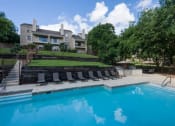 Thumbnail 13 of 60 - One of our Two Pools with an Outdoor Grilling Center at Maxwell Townhomes, Texas