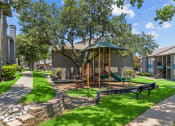 Thumbnail 22 of 58 - our apartments offer a park with a playground  at Vesper, Dallas, TX