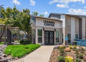 Thumbnail 8 of 58 - a building with the words leasing center on it  at Vesper, Texas, 75254