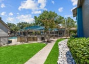 Thumbnail 7 of 58 - take a dip in the pool at the whispering winds apartments in pearland, tx  at Vesper, Dallas, TX, 75254