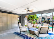 Thumbnail 24 of 27 - A patio with a pool and chairs.