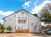 Thumbnail 15 of 27 - A white building with the word "WYTHE" on it.