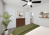 Thumbnail 18 of 79 - a bedroom with a bed and a ceiling fan  at Sunset Heights, San Antonio