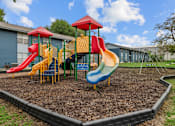 Thumbnail 27 of 79 - a playground at the whispering winds apartments in pearland, tx  at Sunset Heights, San Antonio, TX