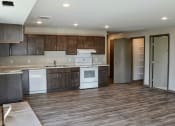 Thumbnail 27 of 54 - a kitchen and living room in a 555 waverly unit