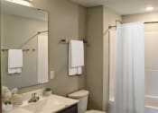 Thumbnail 6 of 54 - a bathroom with a toilet sink and bathtub