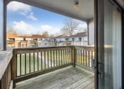 Thumbnail 6 of 7 - the balcony has a view of the yard and the house