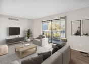 Thumbnail 1 of 7 - a living room with a couch and a tv
