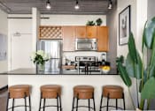 Thumbnail 4 of 29 - Open kitchen with breakfast bar