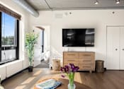 Thumbnail 7 of 29 - Contemporary open-concept design with floor-to-ceiling brightness