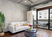 Thumbnail 6 of 29 - Spacious open-concept layout with soaring ceilings and abundant natural light