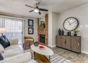 Thumbnail 7 of 16 - an open living room with a fireplace