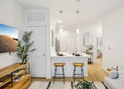 Thumbnail 14 of 140 - Open concept living area with breakfast bar at Matador Apartments, Austin