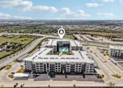 Thumbnail 99 of 103 - Aerial view of apartment community with pool 1 at Cantarra Apartments, Texas, 78653