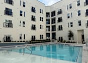 Thumbnail 51 of 83 - Resort-Style Pool area at ThreeTwenty at the Vybe Apartments, Texas