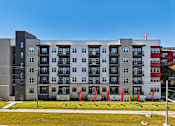 Thumbnail 88 of 140 - Modern apartment building exterior with balconies at Matador Apartments, Austin, TX