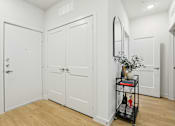 Thumbnail 9 of 140 - Entryway with closet and wood flooring at Matador Apartments, Austin, TX