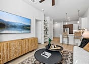 Thumbnail 33 of 127 - A modern living room with a large wooden entertainment center and a flat screen TV mounted on the wall.