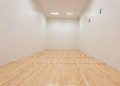 Thumbnail 13 of 59 - a racquetball court in a basement at Avery Ranch, Austin, 78717