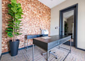 Thumbnail 20 of 59 - an office with a desk and a plant at Avery Ranch, Austin Texas
