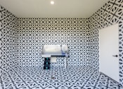 Thumbnail 22 of 59 - a small room with a white sink and black and white tiles on the floor and walls at Avery Ranch, Austin, 78717