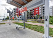 Thumbnail 87 of 140 - Bus stop shelter near residential buildings at Matador Apartments, Austin