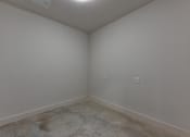 Thumbnail 101 of 140 - Empty room with concrete floor and electrical outlets at Matador Apartments, Austin, TX