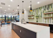 Thumbnail 16 of 44 - clubhouse / community kitchen and wet bar at Bridge at Windsor Park in Northeast Austin