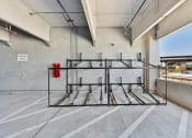 Thumbnail 39 of 44 - Lockable bike racks for convenient Bike storage inside the secured parking garage