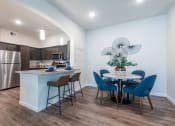 Thumbnail 4 of 65 - Kitchen island of a spacious luxury apartment at Bridge at Paloma 78754 Northeast Austin