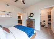 Thumbnail 12 of 65 - Bedroom of a spacious luxury apartment at Bridge at Paloma 78754 Northeast Austin