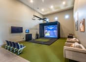 Thumbnail 19 of 65 - Golf simulator and sports simulator at Bridge at Paloma Affordable Apartments 78754 Northeast Austin