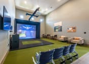 Thumbnail 21 of 65 - Golf simulator and sports simulator at Bridge at Paloma Affordable Apartments 78754 Northeast Austin