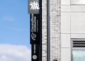 Thumbnail 2 of 15 - A tall building with a sign that says Wide Angle Youth Media.