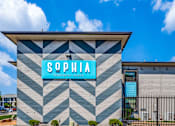 Thumbnail 2 of 57 - A building with a sign that says "SOPHIA" on it.