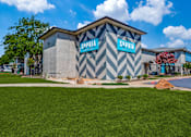 Thumbnail 1 of 57 - A building with a chevron pattern and the word "Sophia" on it.