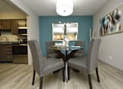Thumbnail 5 of 18 - a dining room with a table and chairs