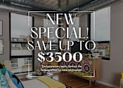 Thumbnail 47 of 47 - A modern living room with a large window and a view of the city, advertising a special offer to save up to $3500.