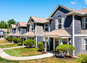 Thumbnail 1 of 17 - the view of a row of suburban homes on a sidewalk