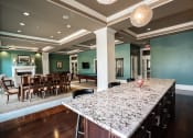 Thumbnail 7 of 22 - Overview of the kitchen and dinning area at the Club Room at the Residences of Creekside.