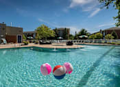 Thumbnail 9 of 20 - our apartments have a large swimming pool with balloons in it at Village Club of Royal Oak, Royal Oak, MI 48067