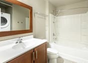 Thumbnail 37 of 47 - a bathroom with a sink toilet and a shower at Ann Arbor City Club, Ann Arbor, 48104