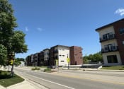 Thumbnail 18 of 18 - a view of an empty street in front of an apartment building